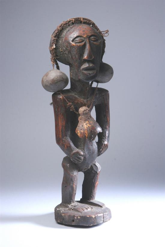 Appraisal: LUBA HEMBA FETISH FIGURE Circa Republic of Congo Calabasse cowrie