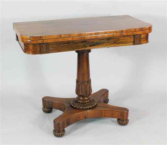 Appraisal: A William IV rosewood card table with carved column on