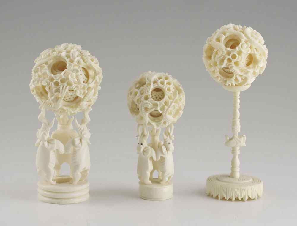 Appraisal: SETS CARVED IVORY MYSTERY BALLS STANDS To include '' dia