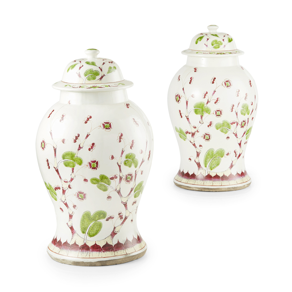 Appraisal: PAIR OF DELFTWARE BALUSTER JARS AND COVERS MODERN with knop