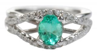 Appraisal: Platinum Emerald and Diamond Ring with center oval faceted emerald