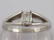 Appraisal: A platinum and diamond solitaire ring the baguette cut diamond