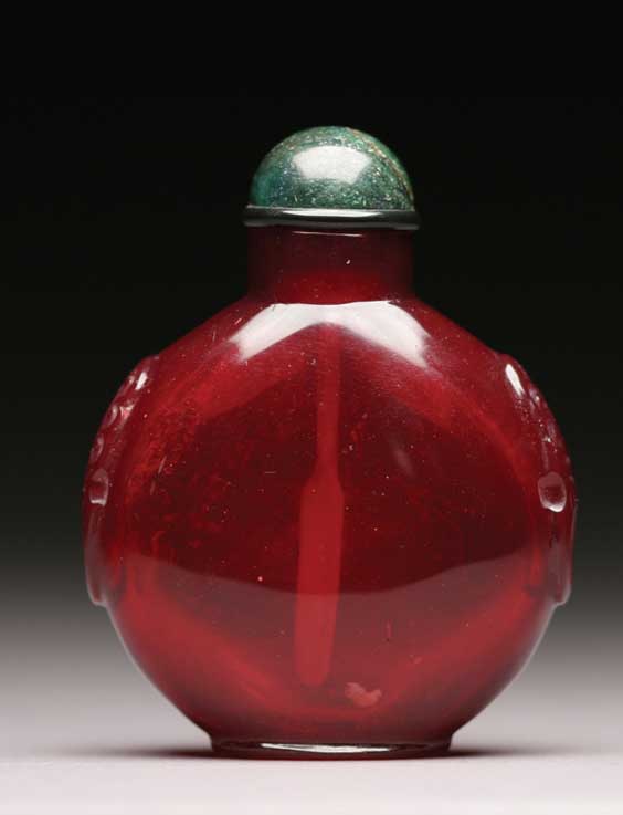 Appraisal: ANTIQUE RUBY GLASS SNUFF BOTTLE Antique ruby-red glass snuff bottle