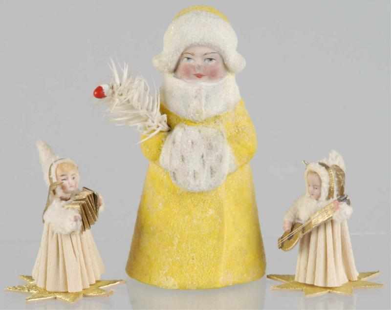 Appraisal: Lot of Christmas Ladies Description Includes one girl holding a