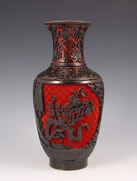 Appraisal: CHINESE BLACK RED CINNABAR VASE Deeply carved black over red