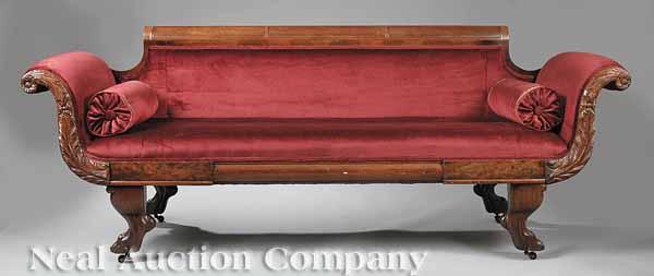 Appraisal: An American Classical Carved Mahogany Sofa th c with restorations