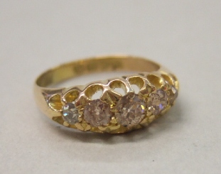 Appraisal: An ct gold and diamond set five stone ring mounted