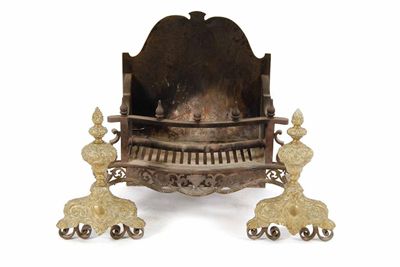 Appraisal: A cast iron and brass firegrate in William and Mary