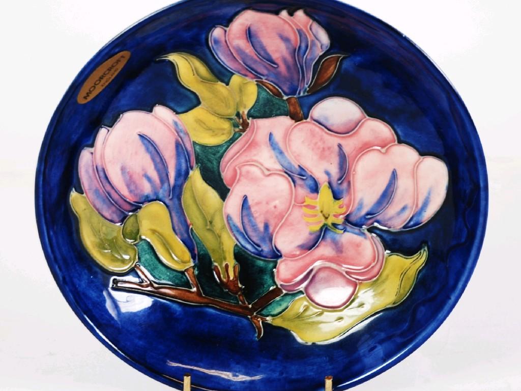 Appraisal: WALTER MOORCROFT PATTERN TUBE LINED POTTERY DISH shallow footed form