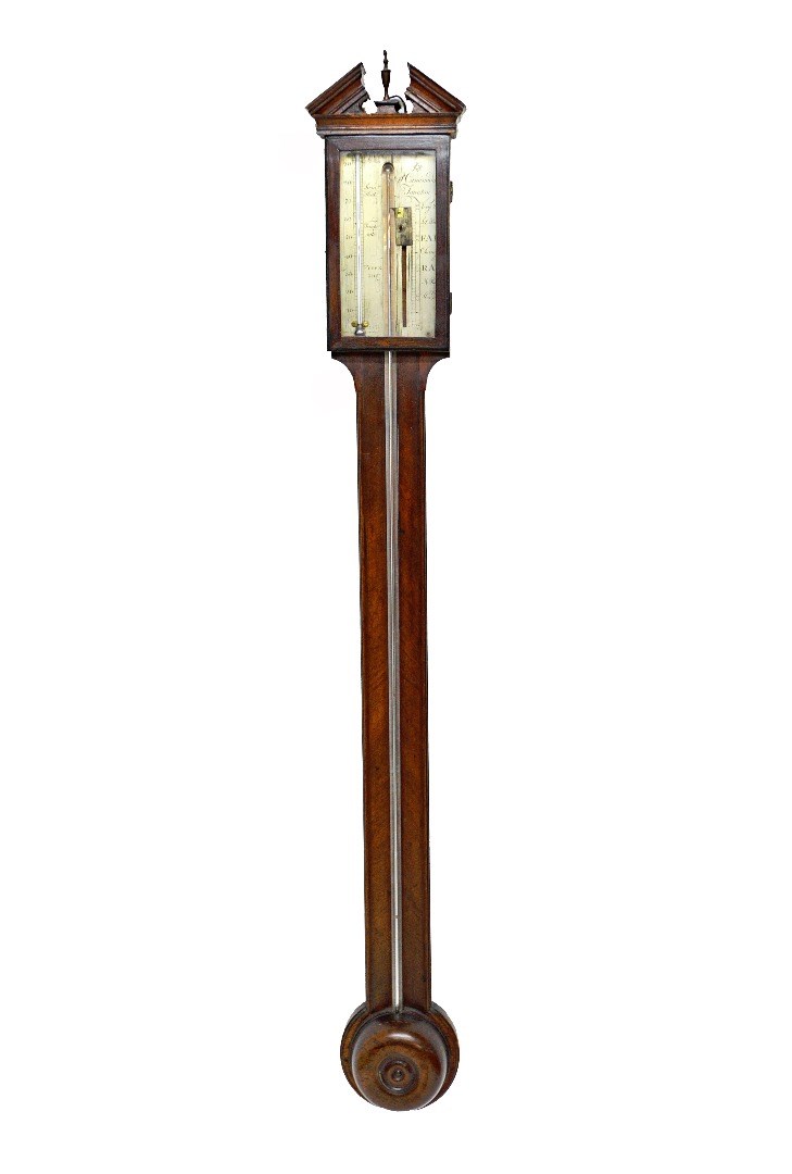 Appraisal: A George III mahogany cased stick barometer by P Caminuda