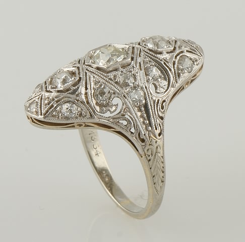 Appraisal: KW filigree - mm round mine cut diamonds clarity VS