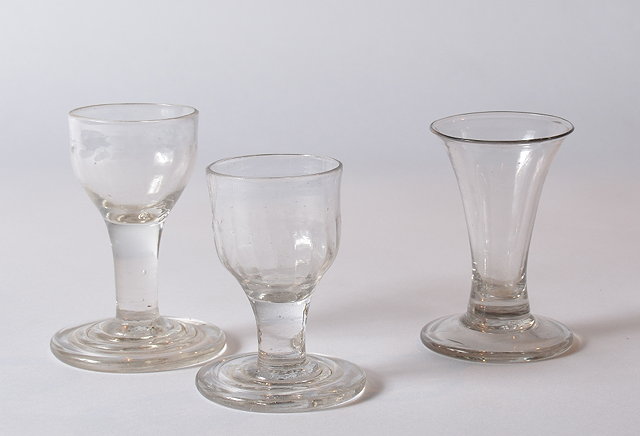 Appraisal: Three firing glasses th th Centurytwo with terraced bases