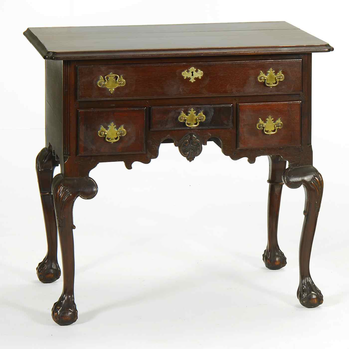 Appraisal: CHIPPENDALE-STYLE LOWBOYCirca In walnut with cut-corner top Full-width drawer above