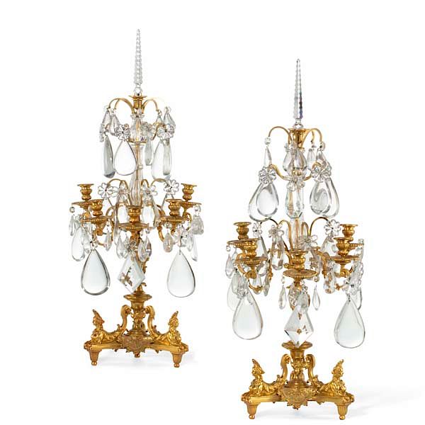 Appraisal: A pair of gilt bronze and cut glass candelabra A