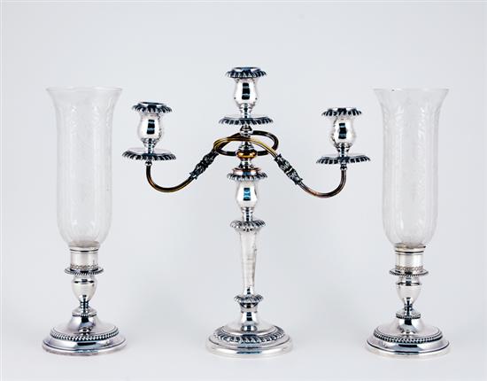 Appraisal: English silverplate candelabra and candlesticks three-light candelabra in the Georgian