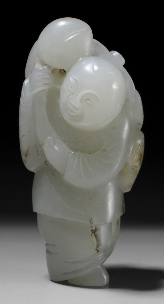 Appraisal: White Jade Toggle Chinese Qing dynasty translucent grayish-white with russet