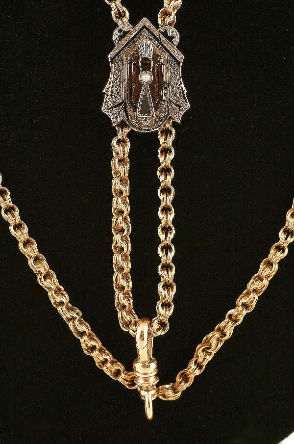 Appraisal: DESCRPTION Victorian watch chain in marked K yellow gold Engraved