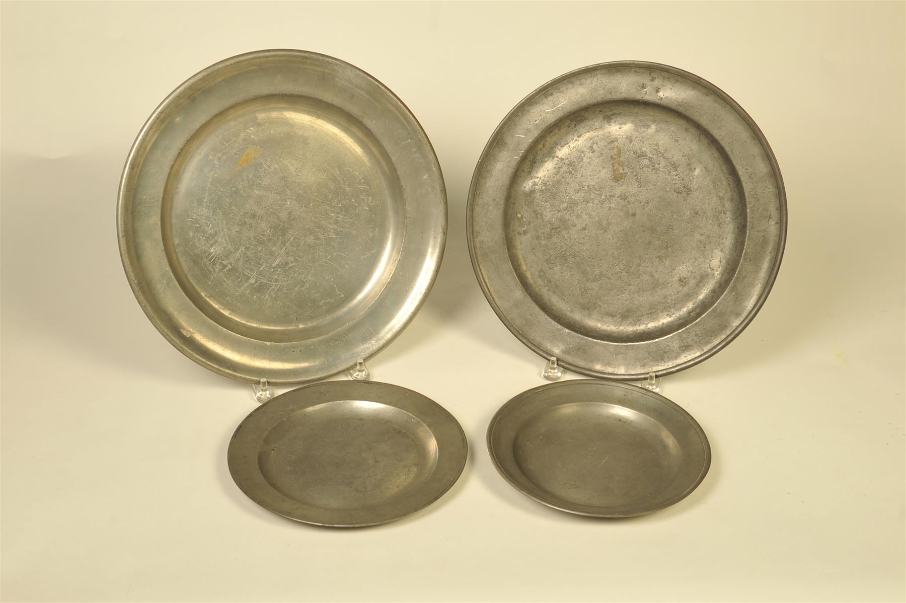 Appraisal: FOUR PEWTER PLATES England st quarter- th century All with