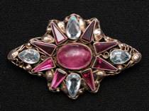 Appraisal: Pink Tourmaline Brooch A pink cabachon tourmaline surounded by eight