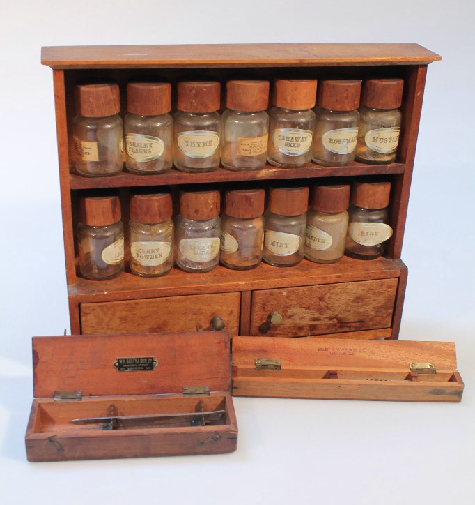 Appraisal: A thC oak spice rack and a quantity of glass