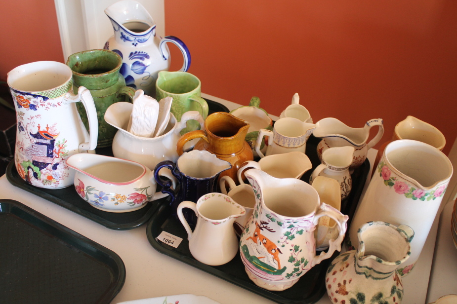 Appraisal: A collection of pottery and porcelain jugs