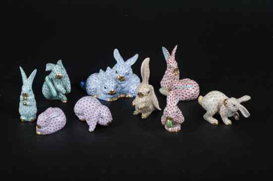 Appraisal: NINE MINIATURE HEREND PORCELAIN RABBITS In various colored fishnet pattern