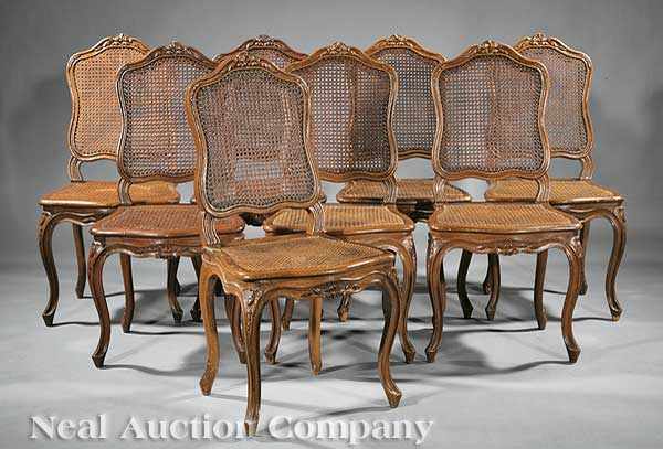 Appraisal: A Set of Ten French Provincial Carved Fruitwood Dining Chairs