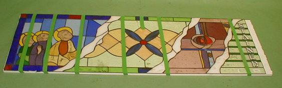 Appraisal: A stained glass panel with a combination of features including