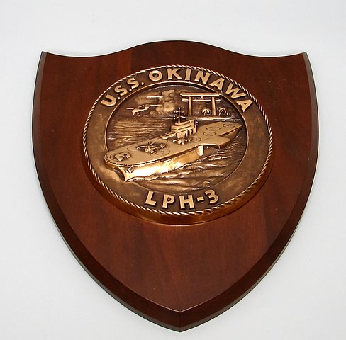 Appraisal: Brass on wood ship plaques including USS Canberra with presentation