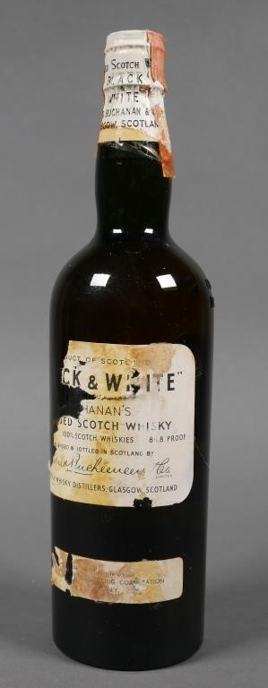 Appraisal: Vintage 's quart proof sealed unopened bottle of Black White