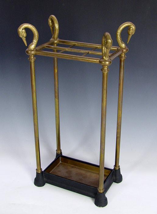 Appraisal: HEAVY BRASS AND IRON UMBRELLA STAND Four brass crane heads