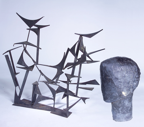 Appraisal: Two metal sculptures one of an abstract head the other