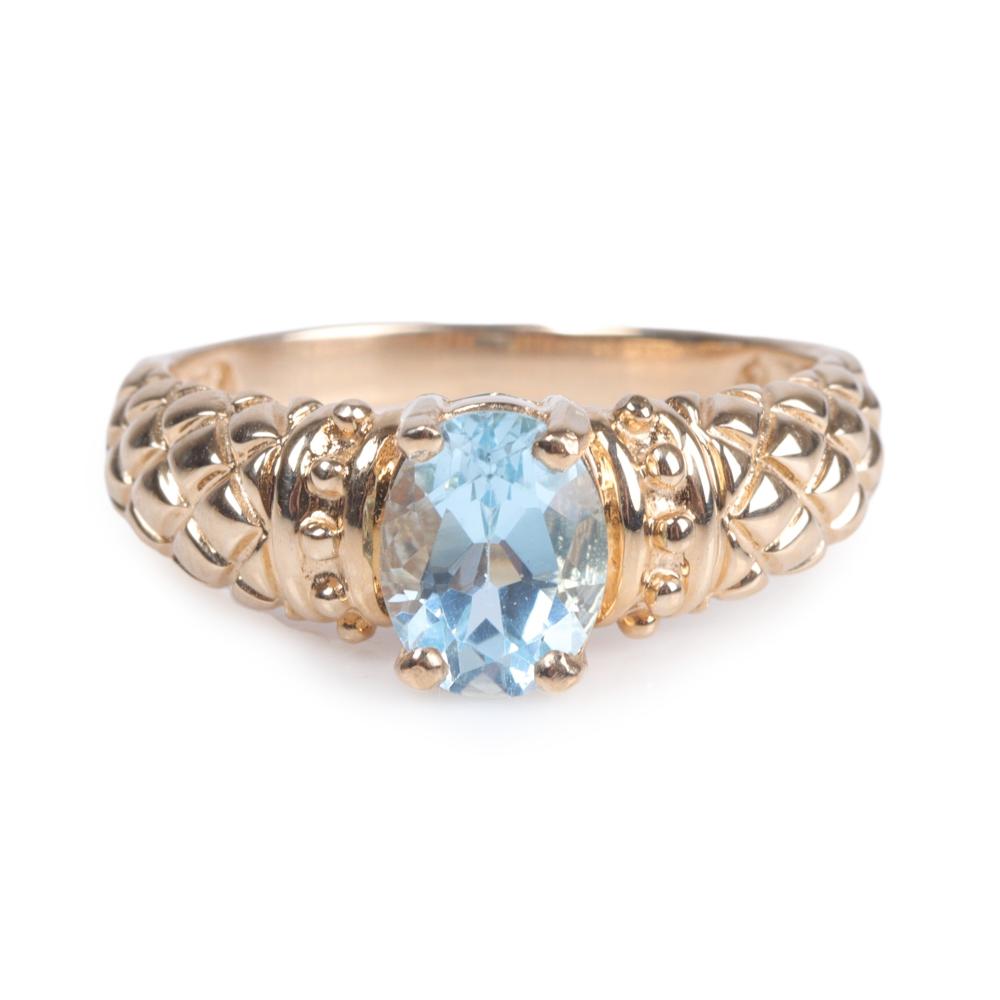 Appraisal: Modern designer K yellow gold aquamarine ring with oval aquamarine