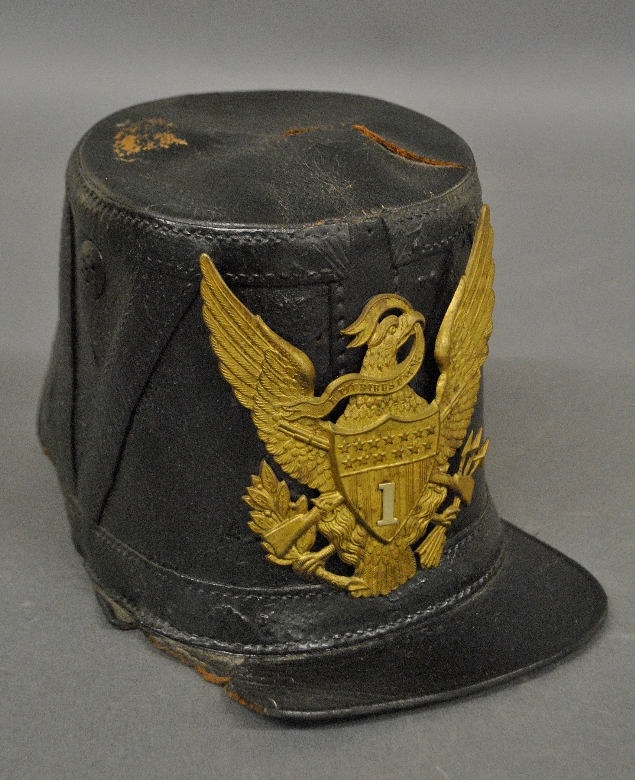 Appraisal: - Civil War Union style leather shako with a brass