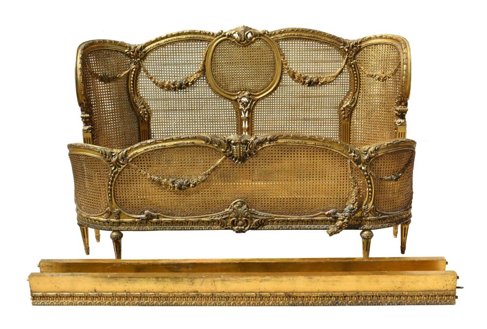 Appraisal: FRENCH BRONZE MOUNTED GILTWOOD CANED BEDCirca Carved with foliage and