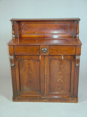 Appraisal: A Victorian mahogany chiffonier the raised superstructure over twin frieze