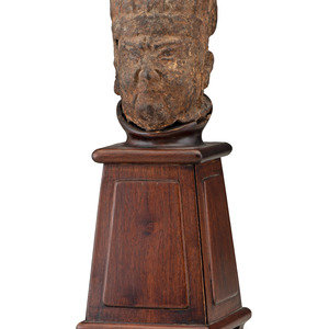 Appraisal: A Chinese Bronze Head of a Priest on a custom