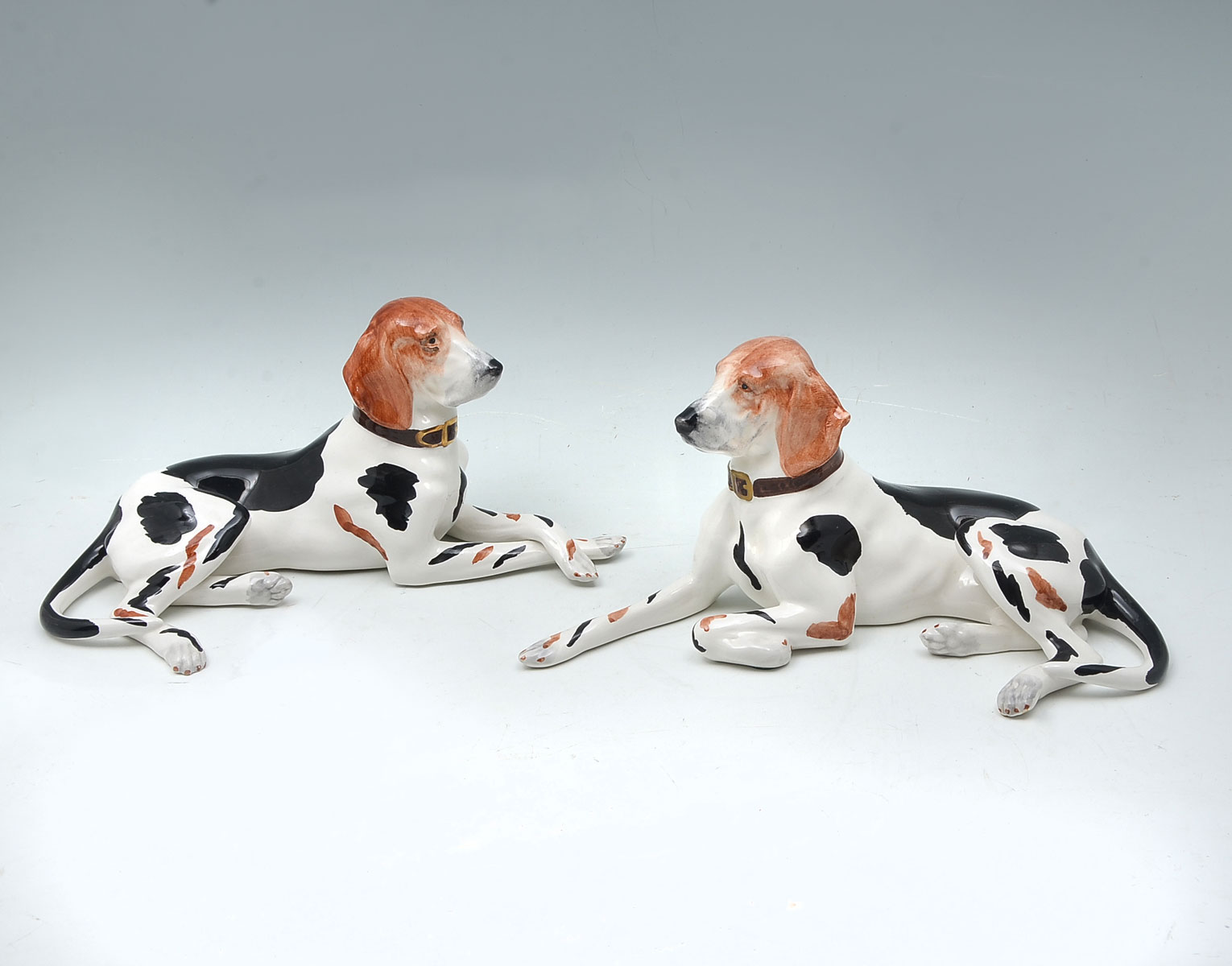 Appraisal: PAIR OF ITALIAN CHELSEA HOUSE PORCELAIN HOUNDS - Opposing recumbent