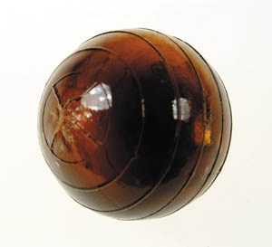 Appraisal: BROWN TARGET BALL Multiple part mold probably three Horizontal bands