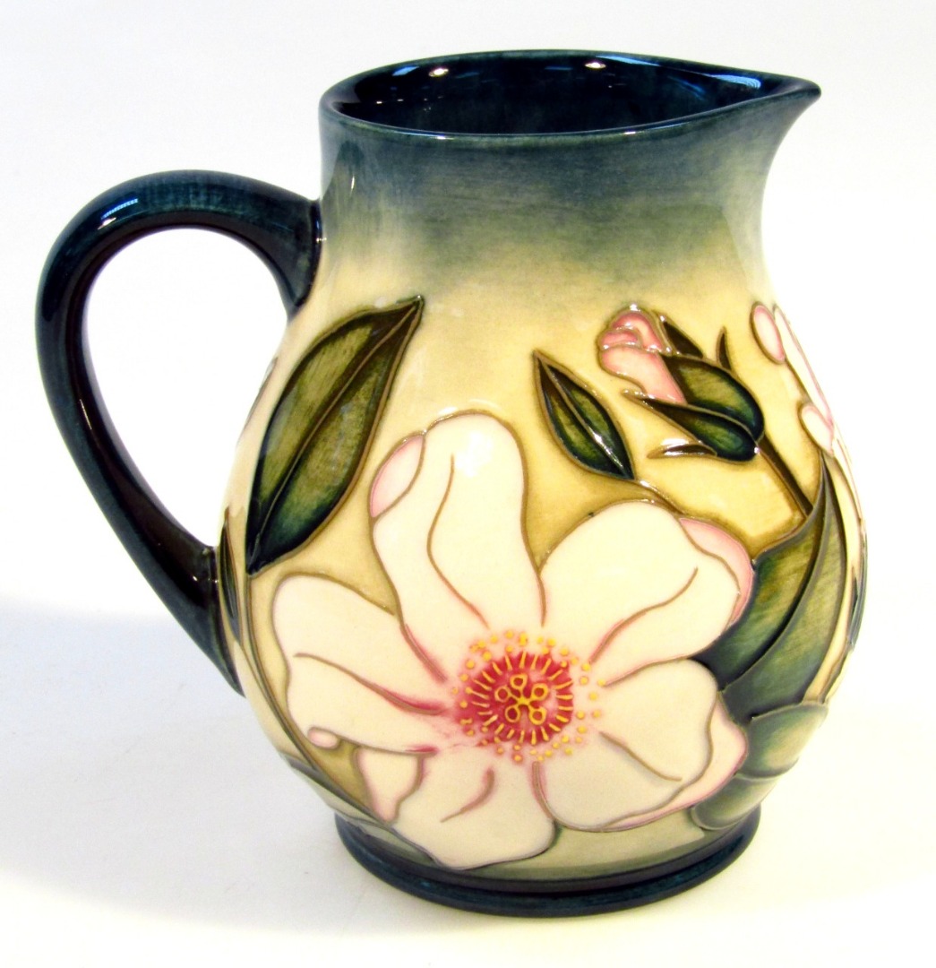 Appraisal: A Moorcroft pottery Hibiscus Moon pattern jug by Sian Leeper