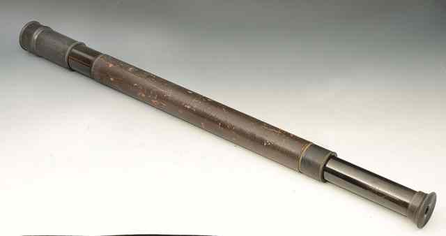 Appraisal: A BLACK ANODISED BRASS SINGLE DRAWER TELESCOPE with leather covered