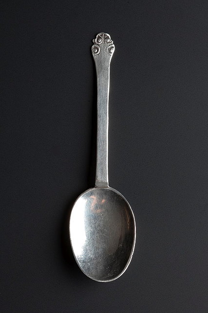 Appraisal: A CHILD'S SILVER TREFID AND LACE BACK RAT TAIL SPOON