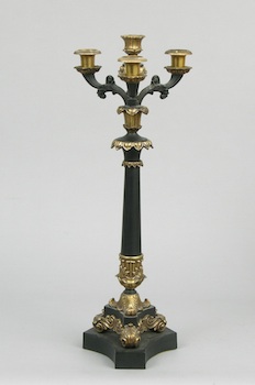 Appraisal: An Ornate Candelabra A decorative traditionally styled candle holder on