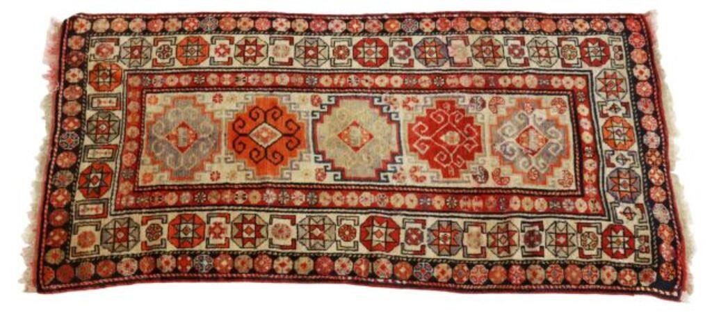 Appraisal: Hand-tied Turkish Caucasian wool rug approx ' l ' w