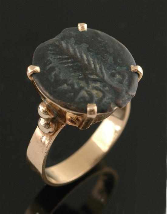 Appraisal: An ancient coin ring The coin with raised palm leaf