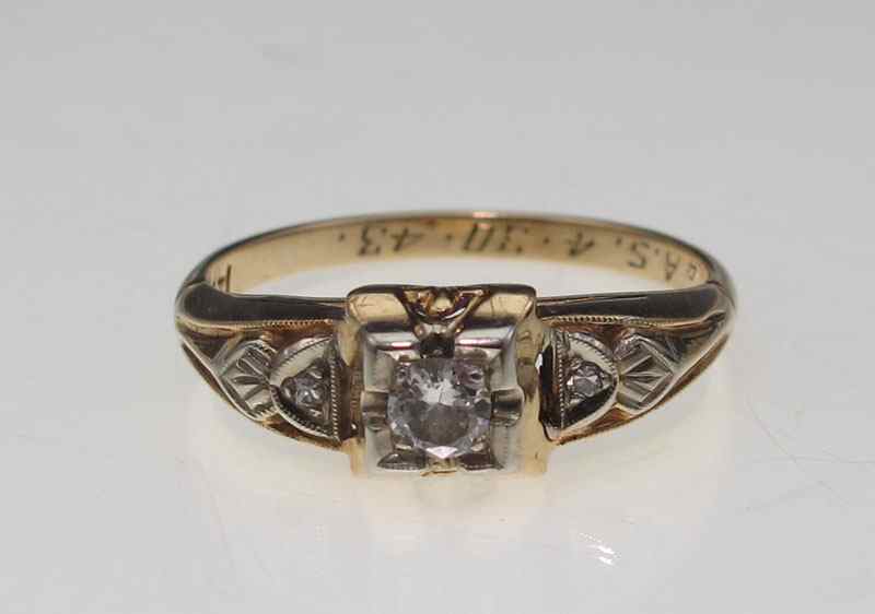 Appraisal: K RETRO DIAMOND ENGAGEMENT RING K yellow gold ring contains