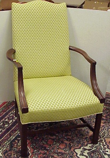 Appraisal: Lolling chair reproduction green upholstery mahogany finish h x w