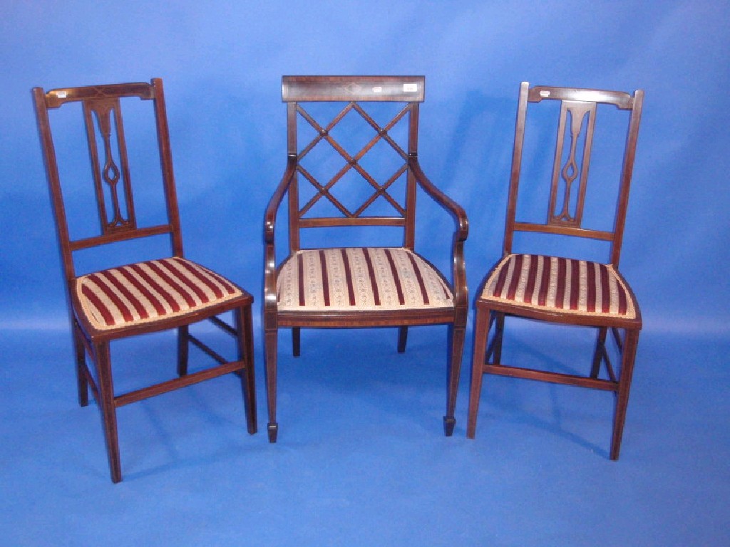 Appraisal: A Harlequin suite of three Edwardian string inlaid bedroom chairs