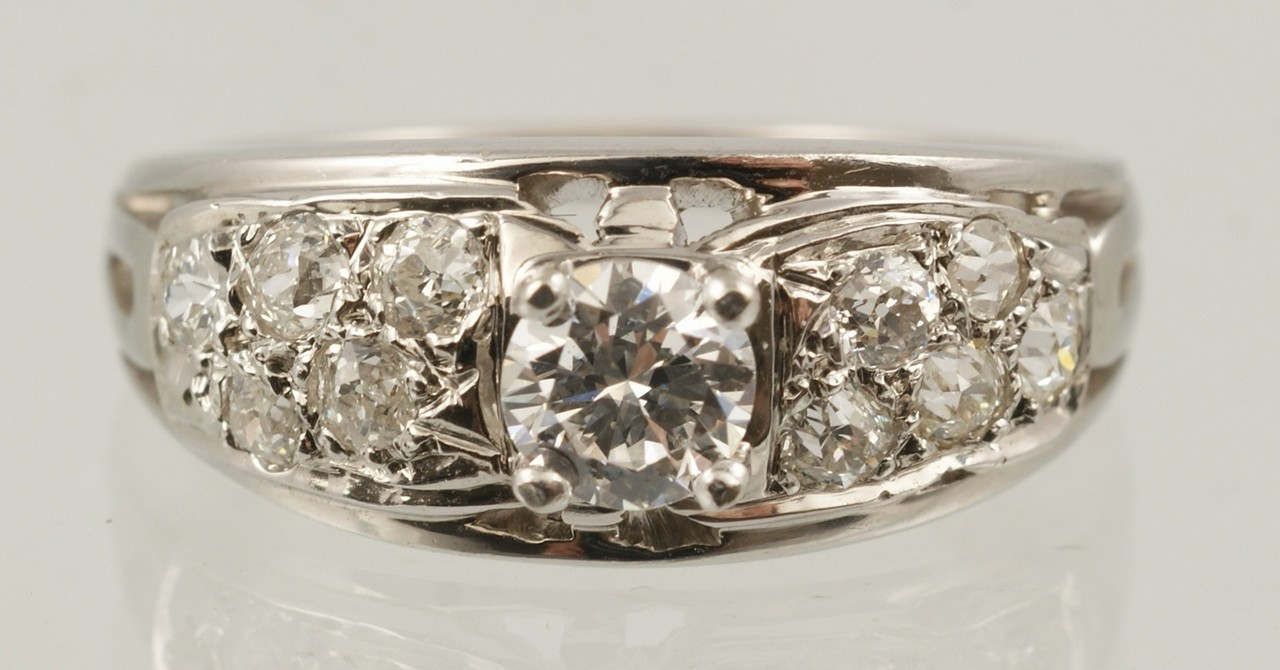 Appraisal: K WG diamond ring pt center round diamond other round