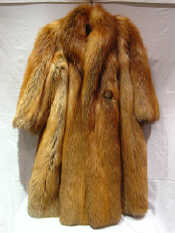 Appraisal: A red fox fur coat with vintage lining cm long